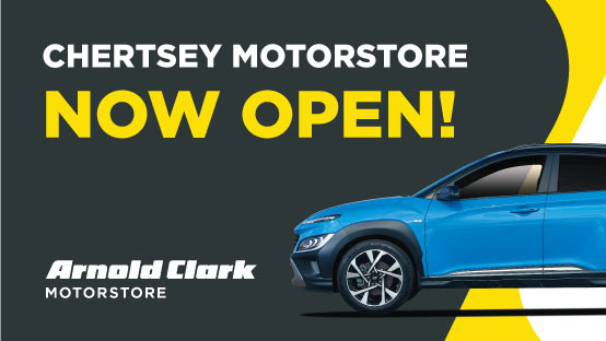 Chertsey Motorstore now open with a blue car facing side on. 