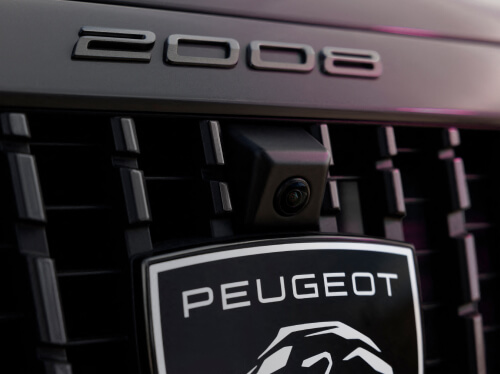 Close up view of Peugeot 2008 parking camera and badge logo