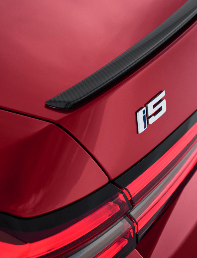 Close up rear view red BMW i5 M60 i5 logo